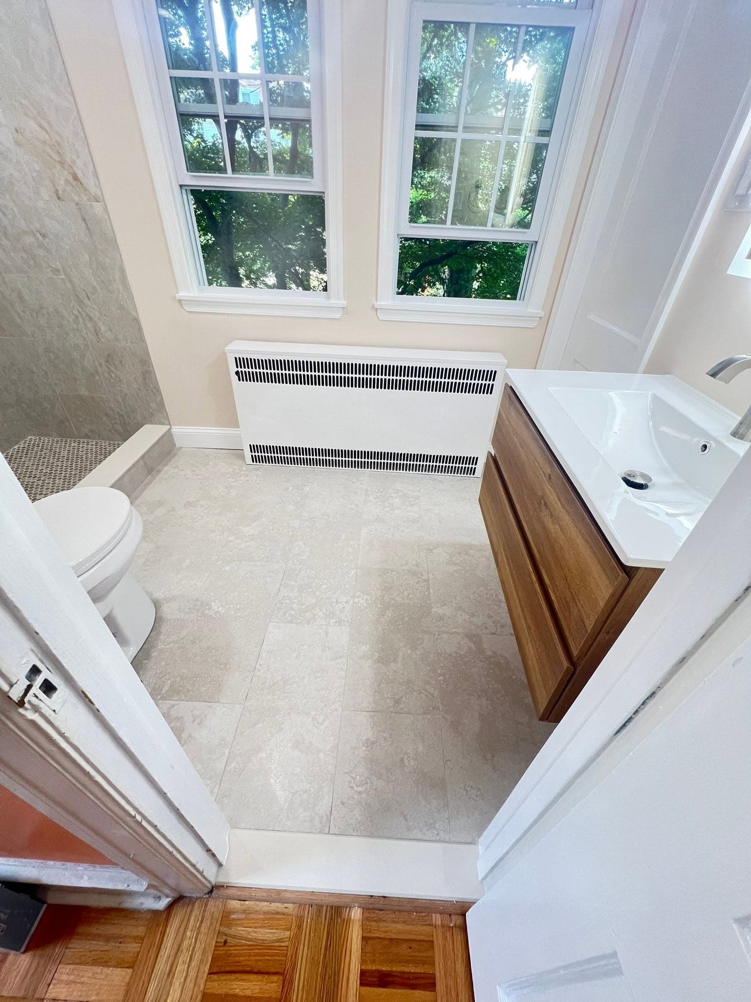 Bathroom with open shower, after view 3