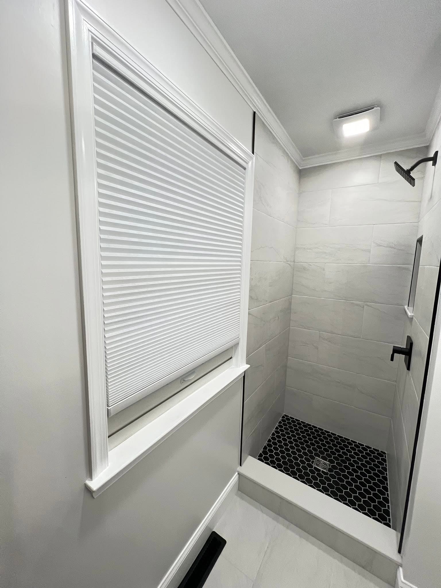 Compact bathroom with glass shower, after view 3