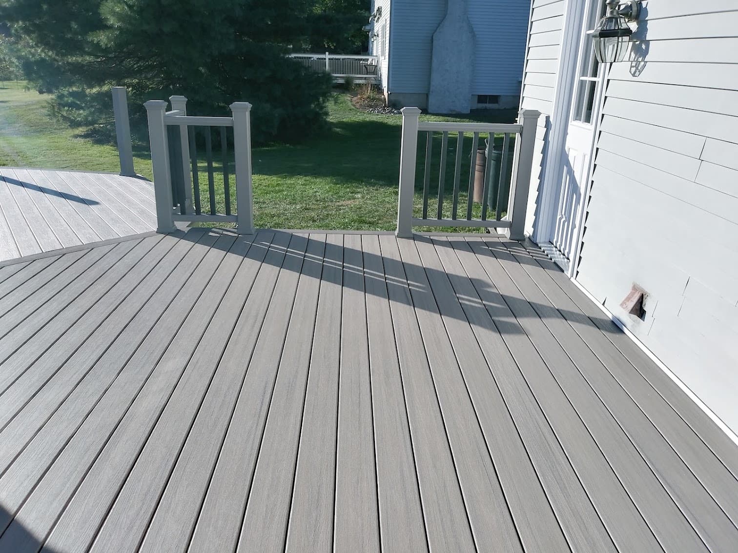 Open-air deck with gray boards, after view 2