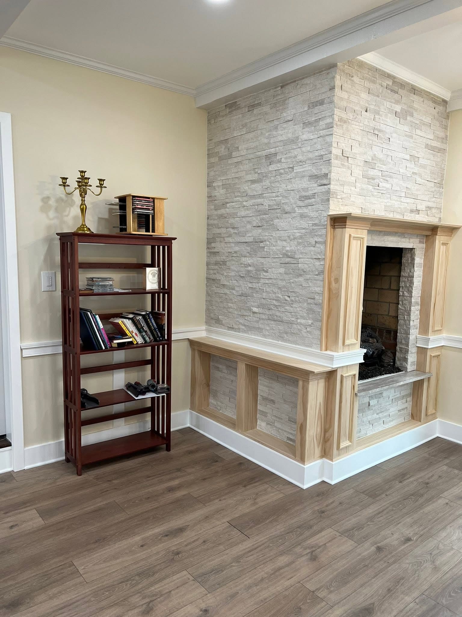 Room with stone-faced fireplace, after view 4