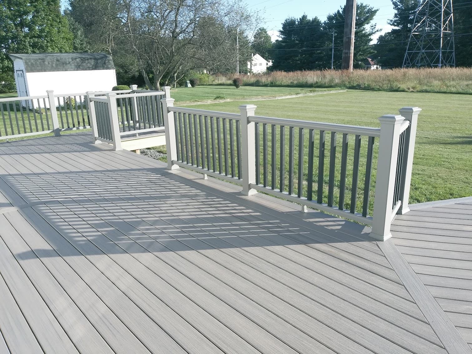 Open-air deck with gray boards, after view 1